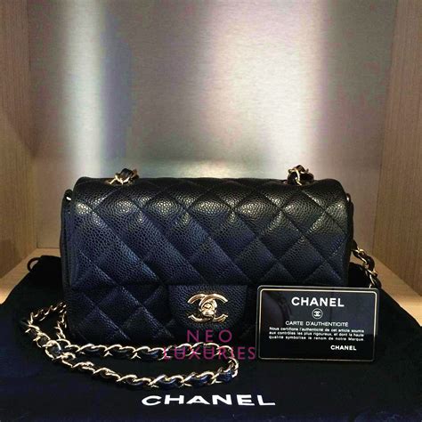 chanel classic flap 20cm mini bag价钱|Chanel mini flap bag with top handle.